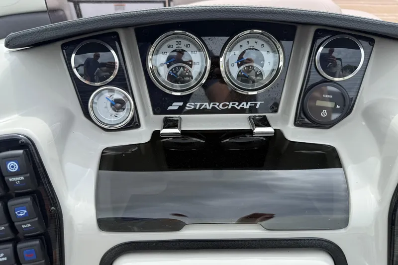 Slide: The Image of Dashboard of 2022 Starcraft SLS 3 boat with gauges and controls. - 19