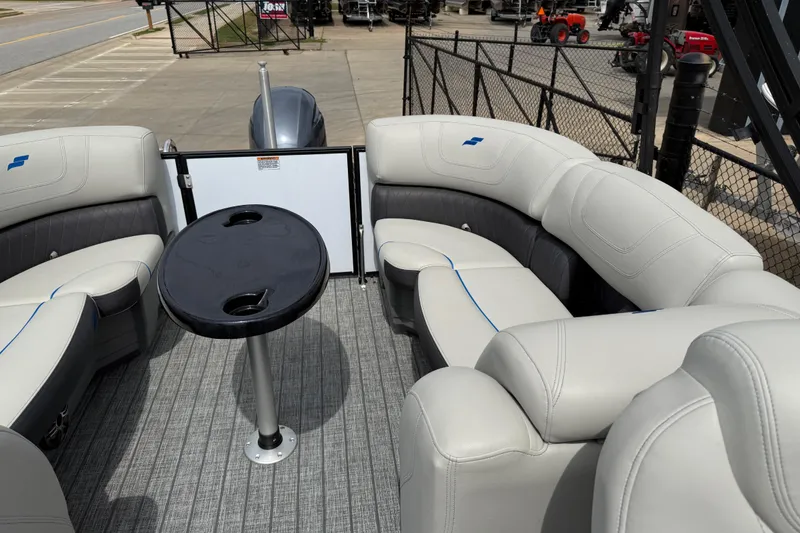 Slide: The Image of 2022 Starcraft SLS 3 boat interior with plush seating and a central table. - 26