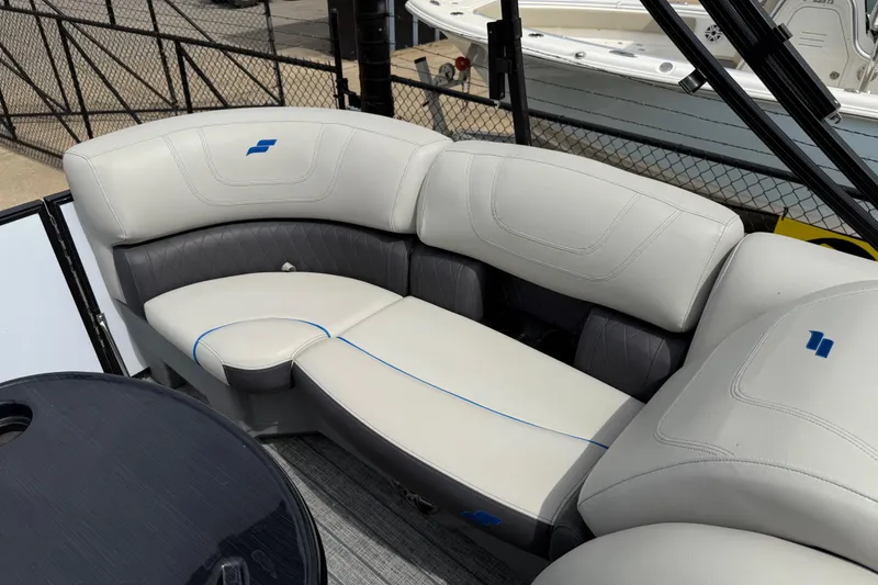 Slide: The Image of 2022 Starcraft SLS 3 boat interior with plush seating and modern design. - 30