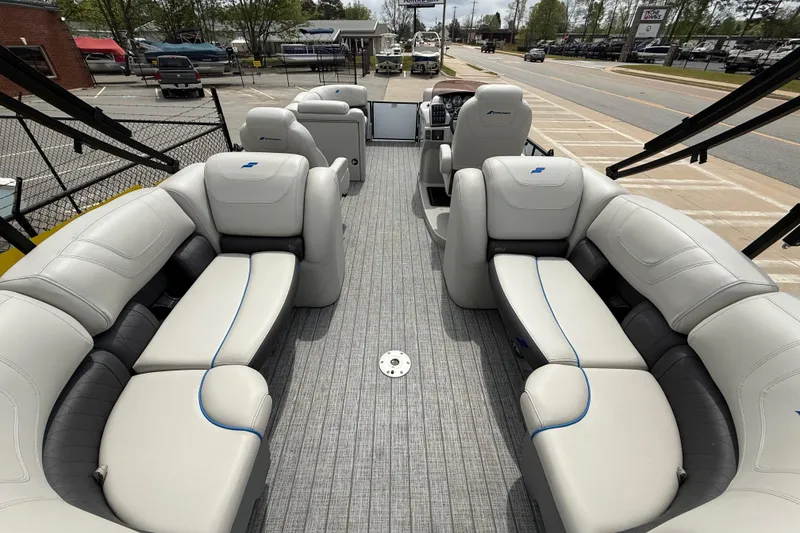 Slide: The Image of 2022 Starcraft SLS 3 pontoon boat interior with luxurious seating and modern design. - 35