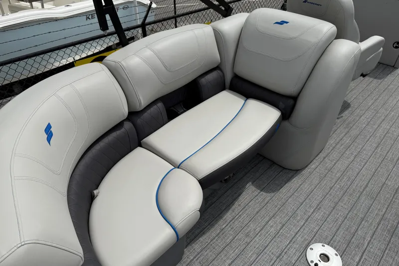 Slide: The Image of Luxurious seating on 2022 Starcraft SLS 3 boat, featuring elegant gray upholstery and blue accents. - 36
