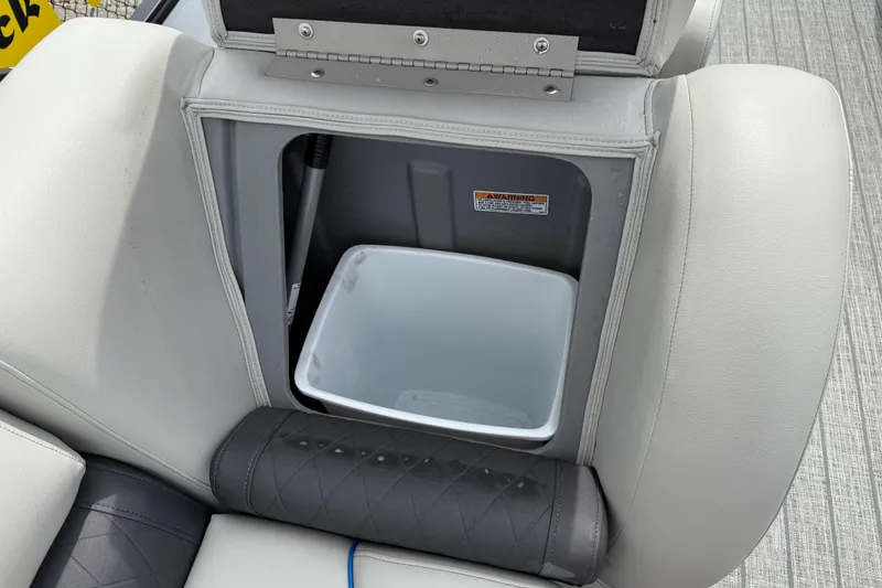 Slide: The Image of Storage compartment in 2022 Starcraft SLS 3 boat with integrated bin. - 38