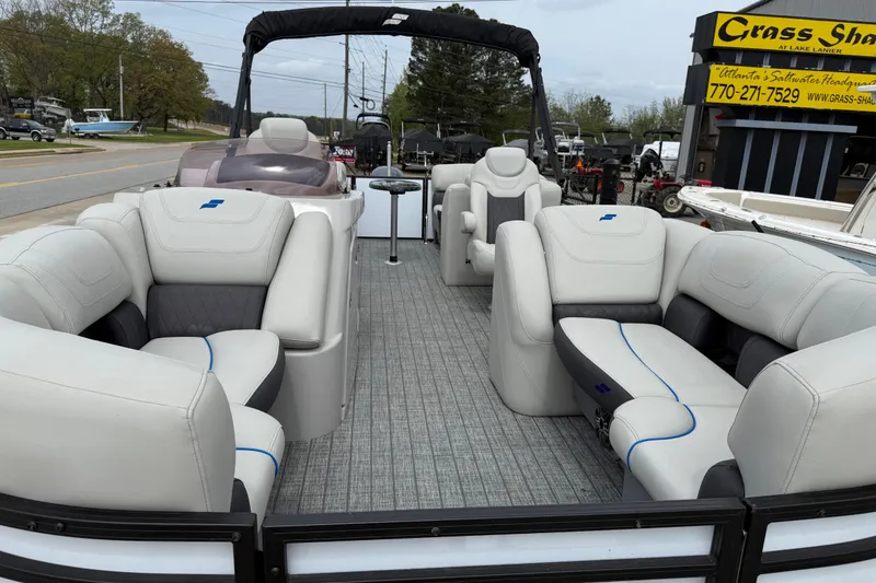 Slide: The Image of 2022 Starcraft SLS 3 pontoon boat with luxurious seating and modern design. - 4