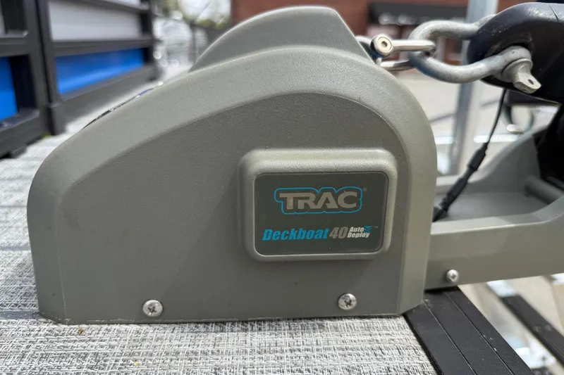 Slide: The Image of TRAC Deckboat 40 Auto Deploy system on 2022 Starcraft SLS 3 boat. - 40