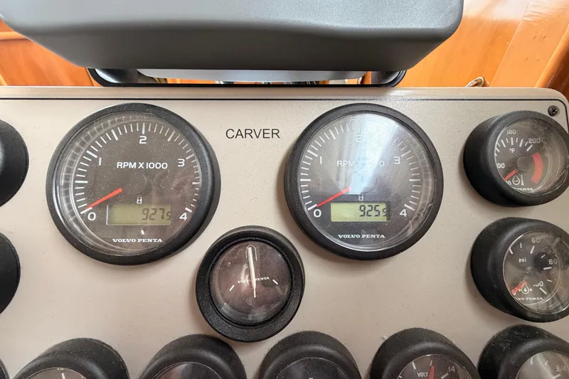 Slide: The Image of Dashboard of a 2005 Carver 41 Cockpit Motor Yacht with Volvo Penta gauges. - 18