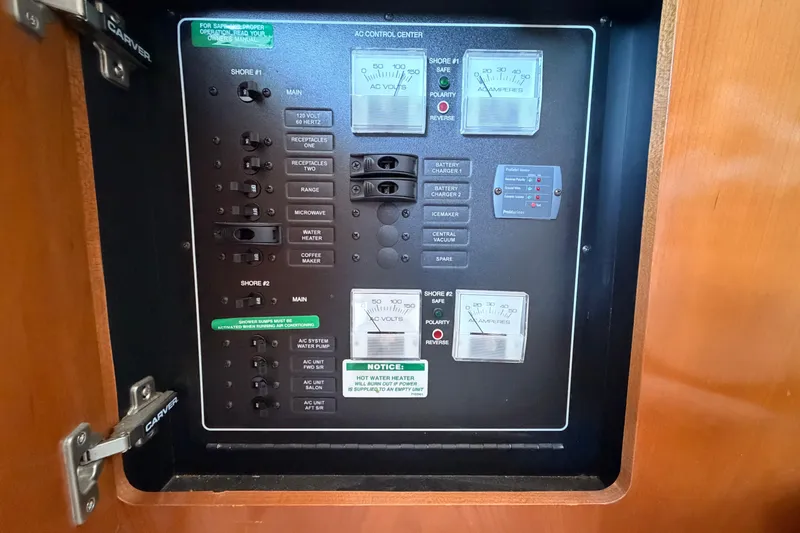 Slide: The Image of Electrical control panel on a 2005 Carver 41 Cockpit Motor Yacht. - 33