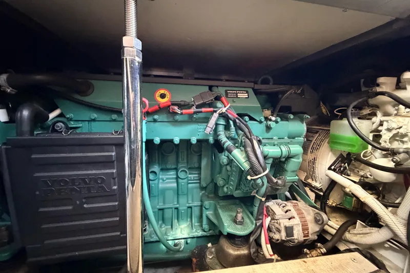 Slide: The Image of Engine compartment of a 2005 Carver 41 Cockpit Motor Yacht with Volvo Penta engine. - 38