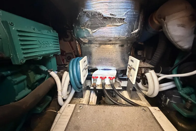 Slide: The Image of Engine room of 2005 Carver 41 Cockpit Motor Yacht with Volvo Penta components. - 40