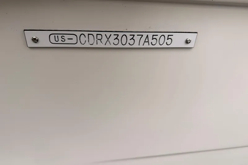 Slide: The Image of Hull identification number on 2005 Carver 41 Cockpit Motor Yacht, US-CDRX3037A505. - 41