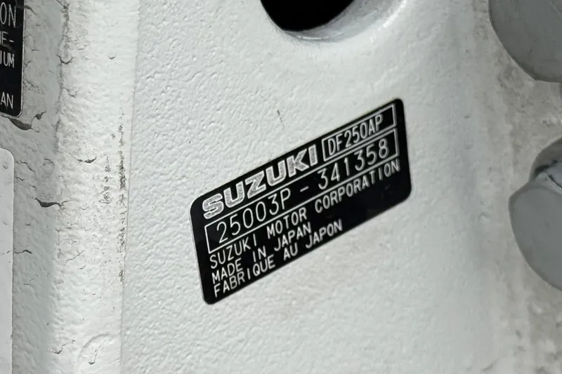 Slide: The Image of Close-up of Suzuki motor label on Manitou EXPLORE 24, 2025 model. - 8