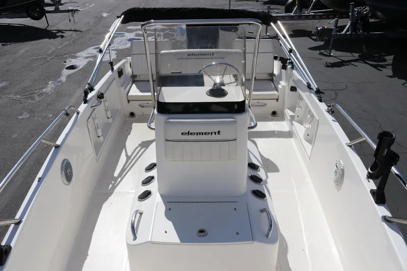 Slide: The Image of 2020 Bayliner Element boat interior with steering console and seating. - 20