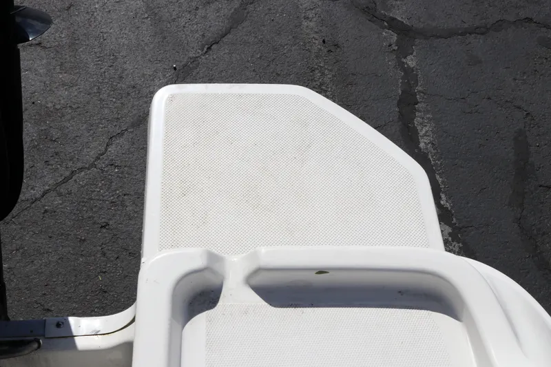 Slide: The Image of 2020 Bayliner Element boat deck detail on textured surface. - 29