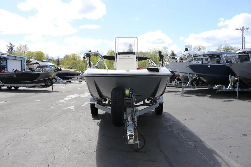 Slide: The Image of 2020 Bayliner Element boat on trailer in outdoor dealership lot. - 6