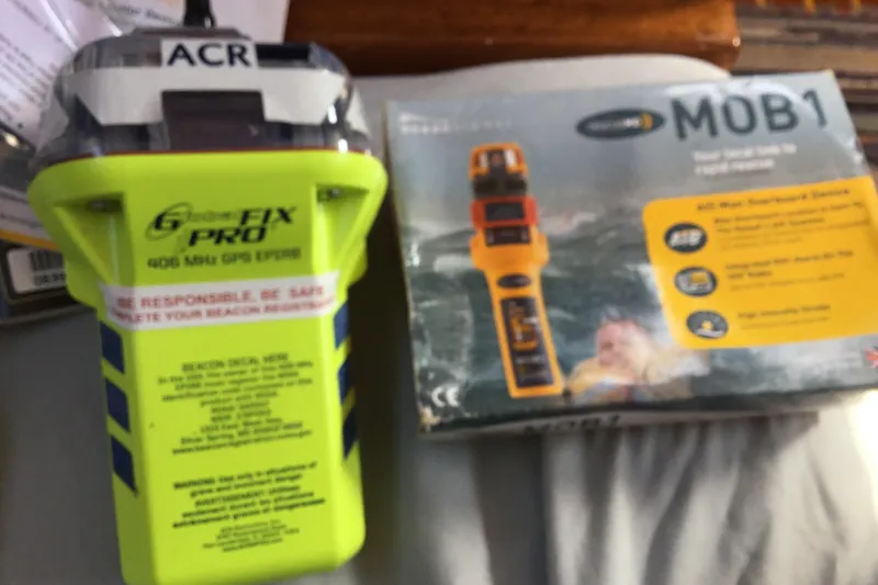 Slide: The Image of ACR GlobalFix Pro EPIRB and Ocean Signal MOB1 device on a Gulfstar 37, 1977. - 15