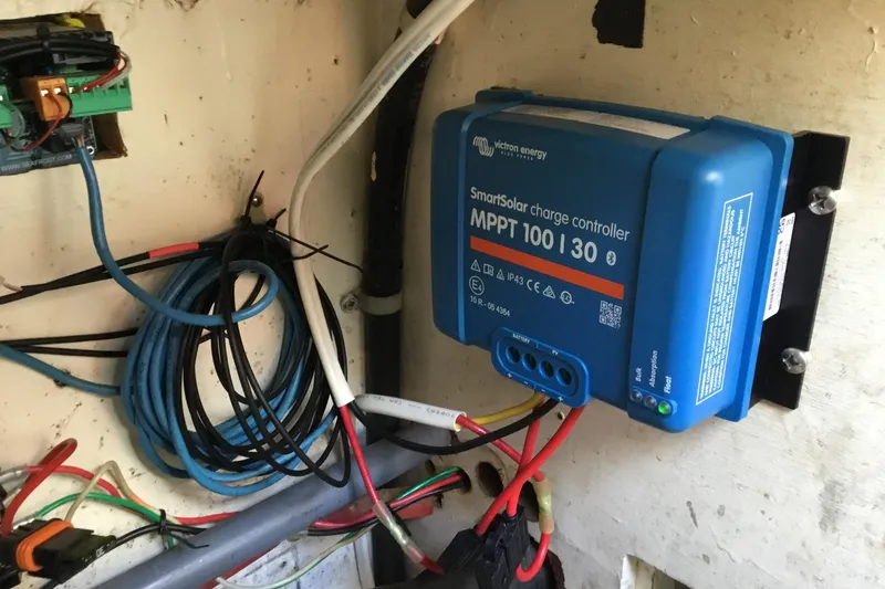 Slide: The Image of SmartSolar charge controller installed on a 1977 Gulfstar 37 sailboat. - 18