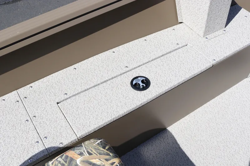 Slide: The Image of 2026 Smoker Craft Freedom 160 TL boat interior with textured flooring and storage compartment. - 10