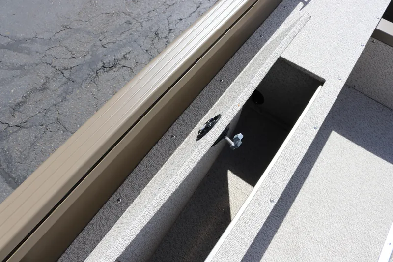 Slide: The Image of 2026 Smoker Craft Freedom 160 TL boat interior storage compartment. - 13