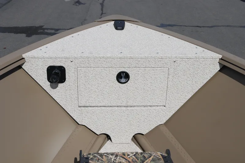 Slide: The Image of 2026 Smoker Craft Freedom 160 TL boat interior, featuring a textured storage compartment. - 14