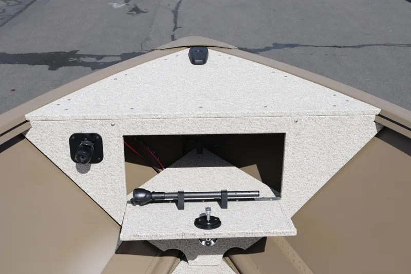 Slide: The Image of 2026 Smoker Craft Freedom 160 TL boat interior, featuring a storage compartment and control panel. - 15