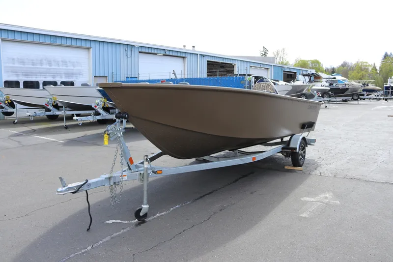 Slide: The Image of 2026 Smoker Craft Freedom 160 TL boat on trailer in outdoor lot. - 5