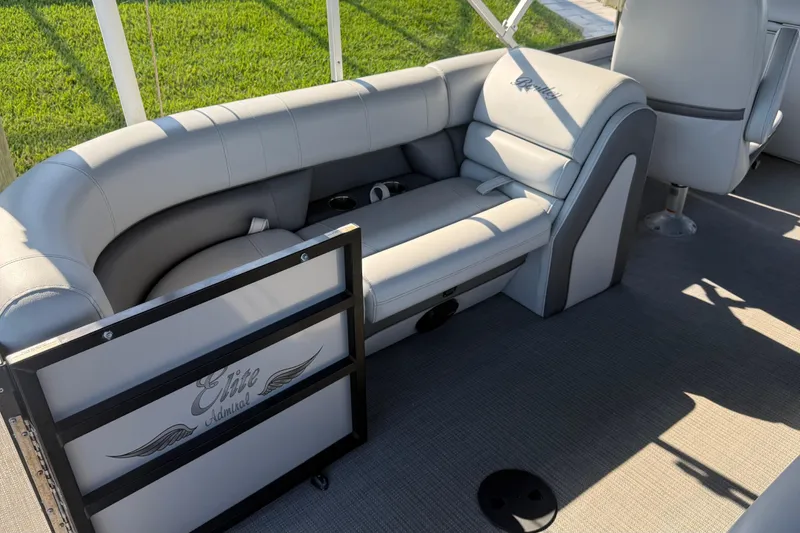 Slide: The Image of 2021 Bentley Pontoons 220/223 Elite Admiral interior with plush seating and elegant design. - 10