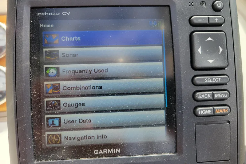 Slide: The Image of Garmin Echomap CV displaying navigation options on a Cobalt 293, 2002 model. - 14