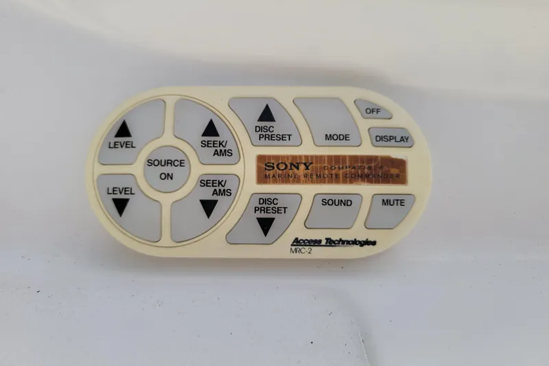 Slide: The Image of Sony marine remote commander with various control buttons, compatible with Cobalt 293, 2002 model. - 19