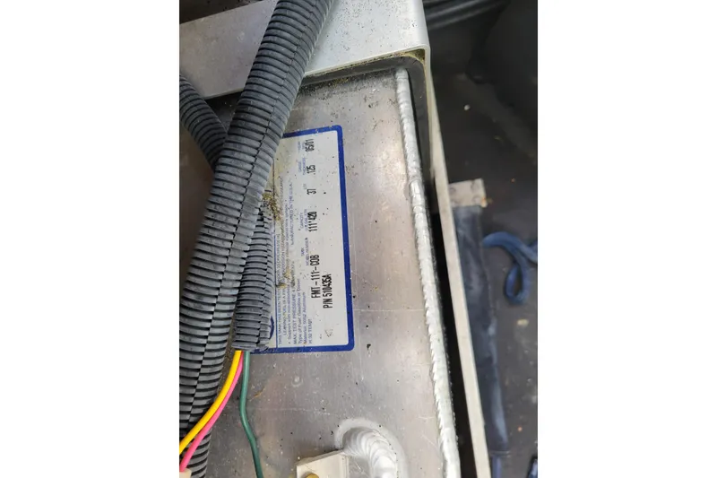 Slide: The Image of Close-up of a 2002 Cobalt 293 component with wiring and label details. - 42