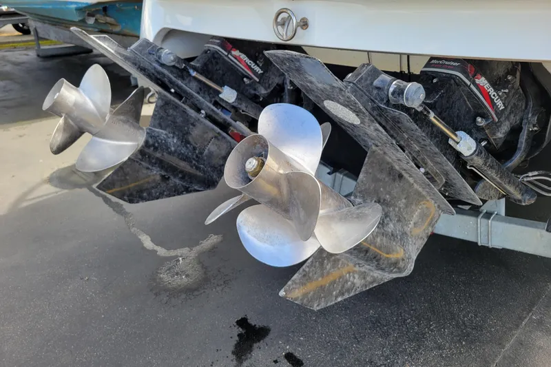 Slide: The Image of Dual propellers on a 2002 Cobalt 293 boat with MerCruiser engines. - 48