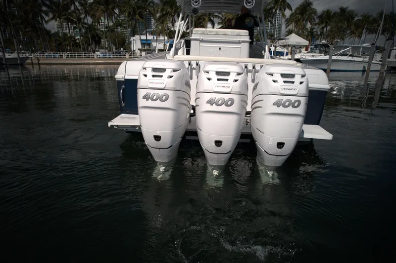 Slide: The Image of 2002 Intrepid 377 Walkaround Cuddy with triple 400 horsepower engines. - 18