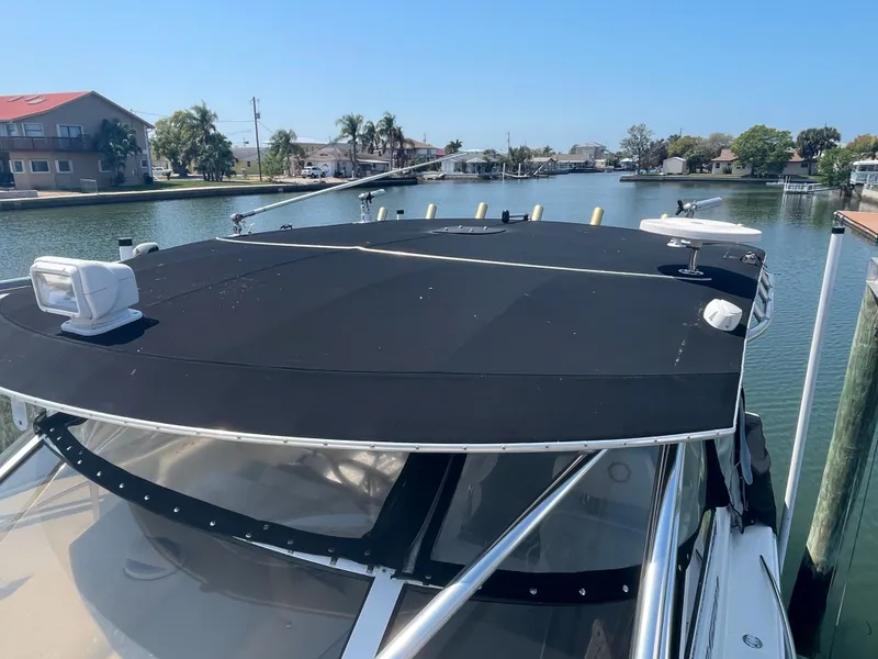 Slide: The Image of 2006 Fountain 33 Sport Fisherman boat docked on a sunny day. - 10