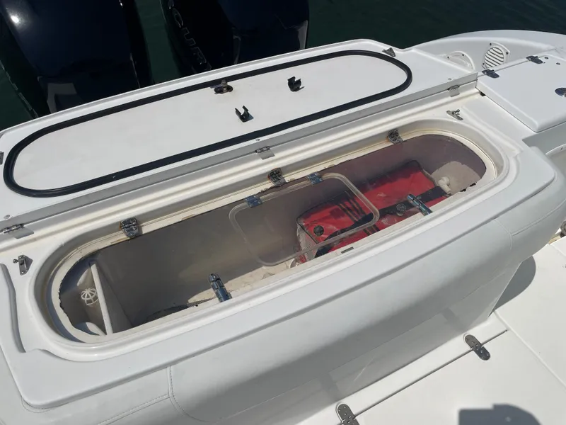 Slide: The Image of Storage compartment on a 2006 Fountain 33 Sport Fisherman boat. - 12