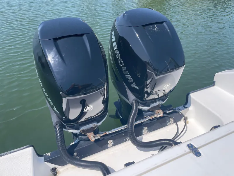 Slide: The Image of Two Mercury outboard engines on a 2006 Fountain 33 Sport Fisherman. - 17