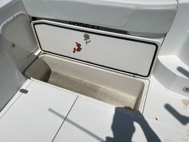 Slide: The Image of Storage compartment on a 2006 Fountain 33 Sport Fisherman boat. - 21