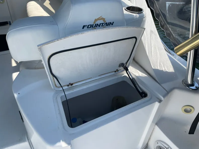 Slide: The Image of Open storage compartment on a 2006 Fountain 33 Sport Fisherman boat. - 29