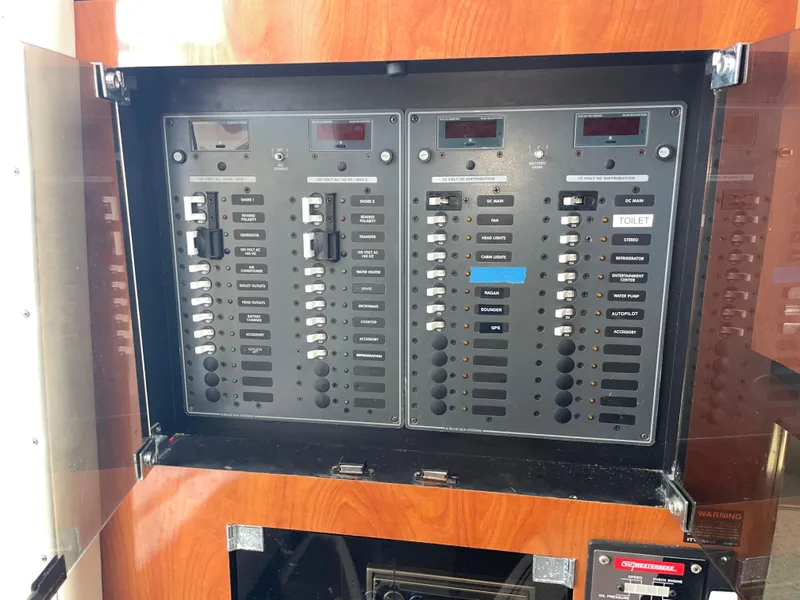 Slide: The Image of Electrical control panel on a 2006 Fountain 33 Sport Fisherman boat. - 41