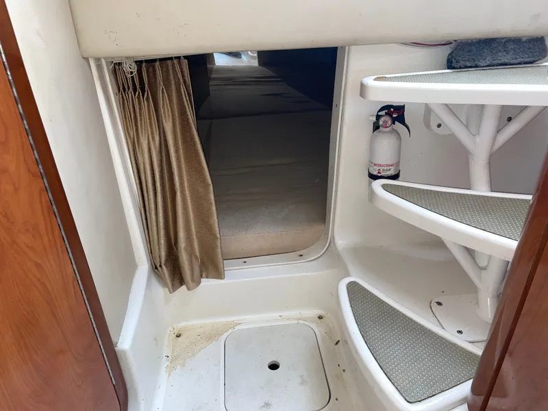 Slide: The Image of Interior of 2006 Fountain 33 Sport Fisherman with stairs and fire extinguisher. - 44