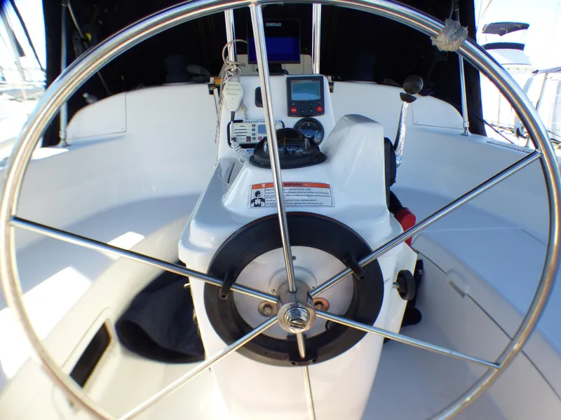 Slide: The Image of Steering wheel of a 1998 Hunter 34 yacht. - 11