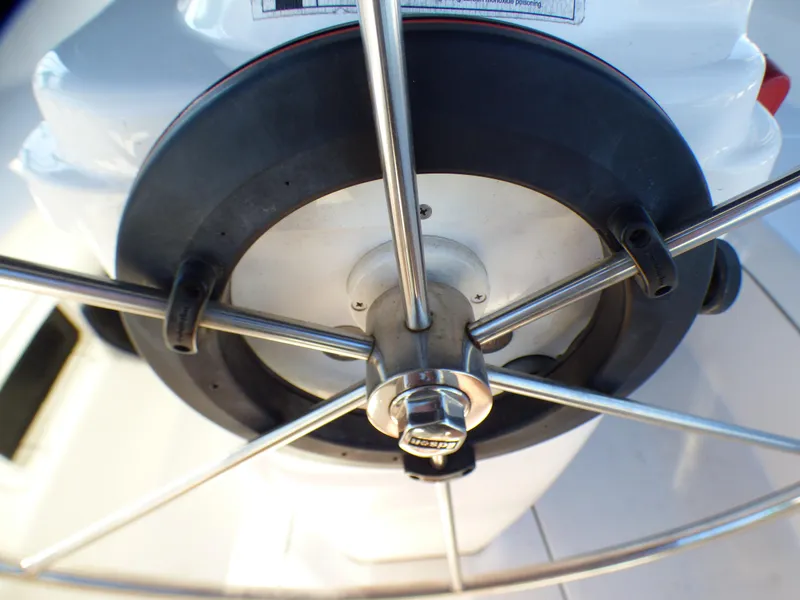 Slide: The Image of Steering wheel of a 1998 Hunter 34 sailboat. - 12