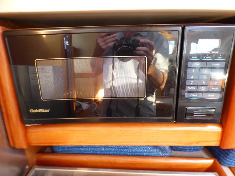Slide: The Image of GoldStar microwave in a 1998 Hunter 34 yacht. - 32