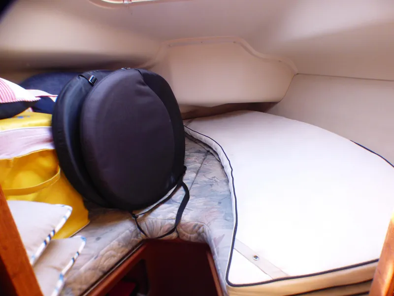 Slide: The Image of Interior of a 1998 Hunter 34 yacht with sleeping area. - 35