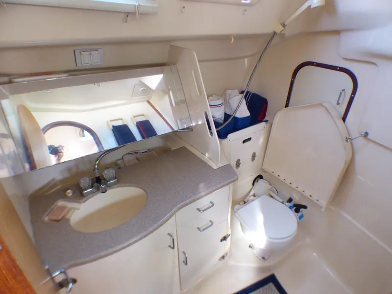 Slide: The Image of Interior of a Hunter 34 yacht, bathroom with sink and toilet. - 36