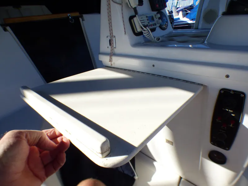 Slide: The Image of Interior of a 1998 Hunter 34 sailboat with a foldable table. - 45