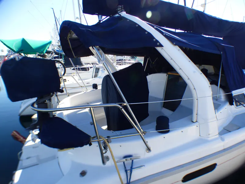 Slide: The Image of 1998 Hunter 34 sailboat docked at marina. - 5