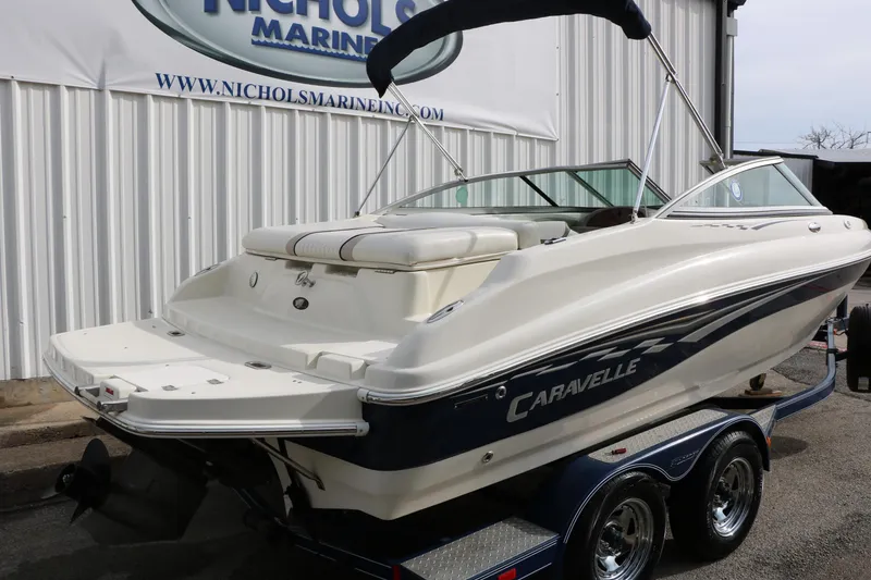Slide: The Image of 2006 Caravelle 207 Bow Rider boat on trailer at Nichols Marine. - 6