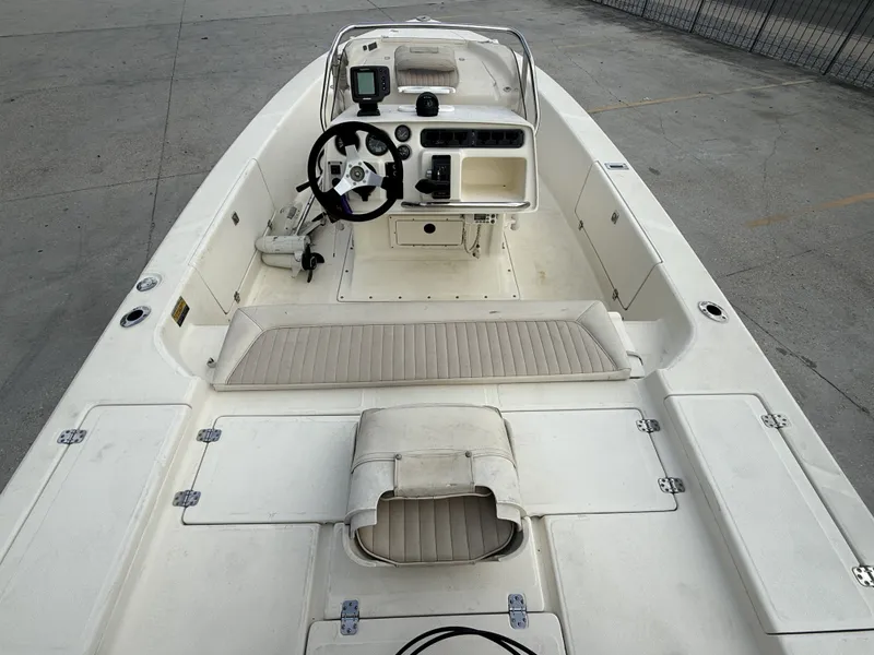 Slide: The Image of Scout 192 Sportfish 2000, interior view of helm and seating area. - 12
