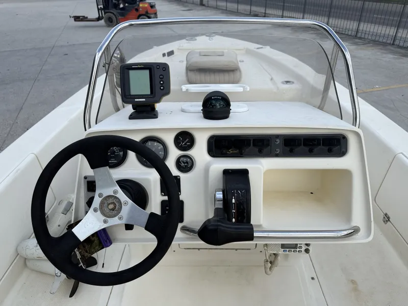 Slide: The Image of Control console of a 2000 Scout 192 Sportfish boat. - 13