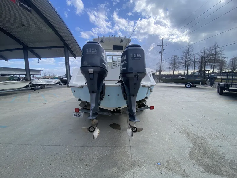 Slide: The Image of 2006 Polar 2300 WA boat with twin Yamaha 115 outboard engines. - 10