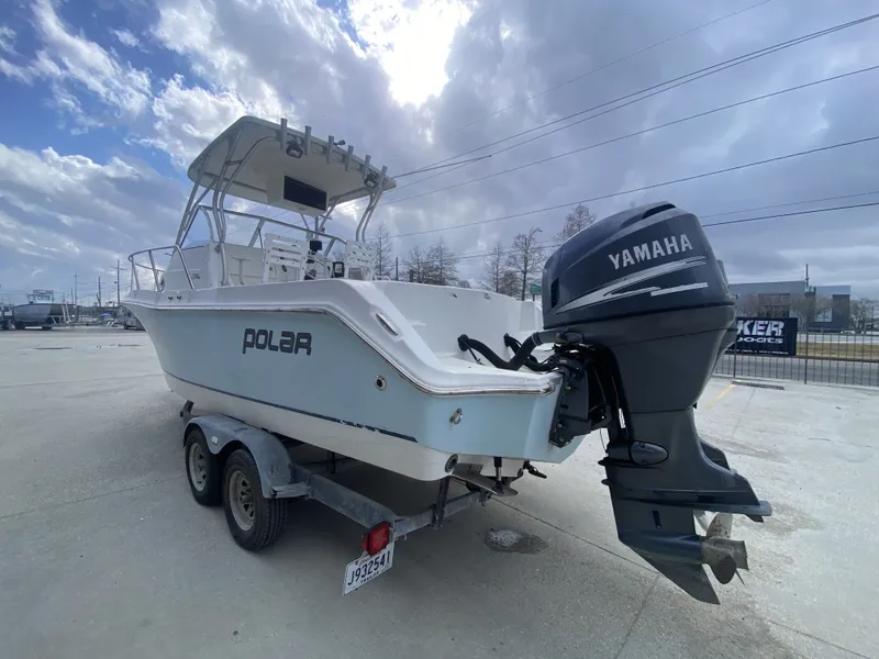 Slide: The Image of 2006 Polar 2300 WA boat with Yamaha outboard motor. - 11