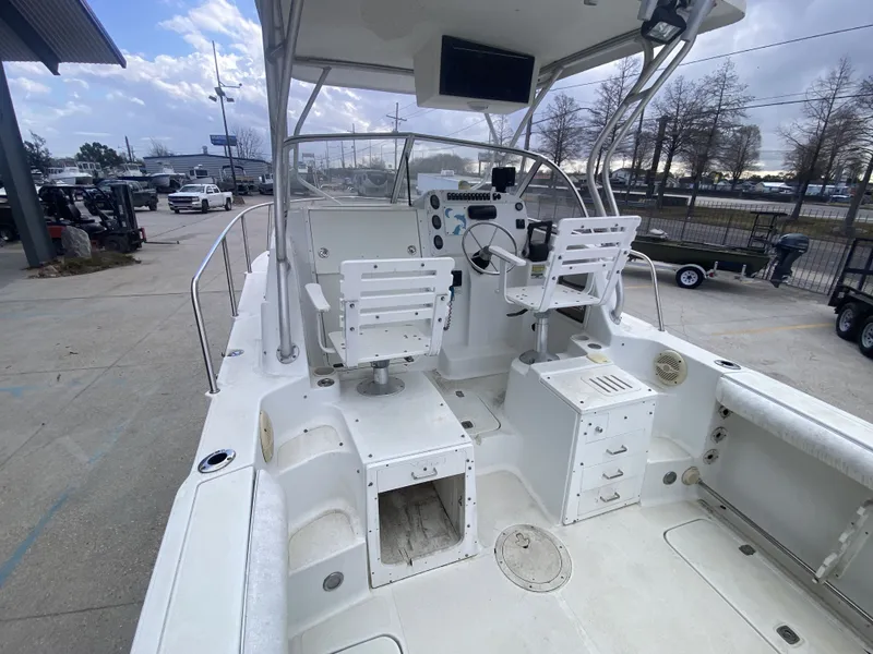 Slide: The Image of Interior view of a 2006 Polar 2300 WA boat with helm station. - 13
